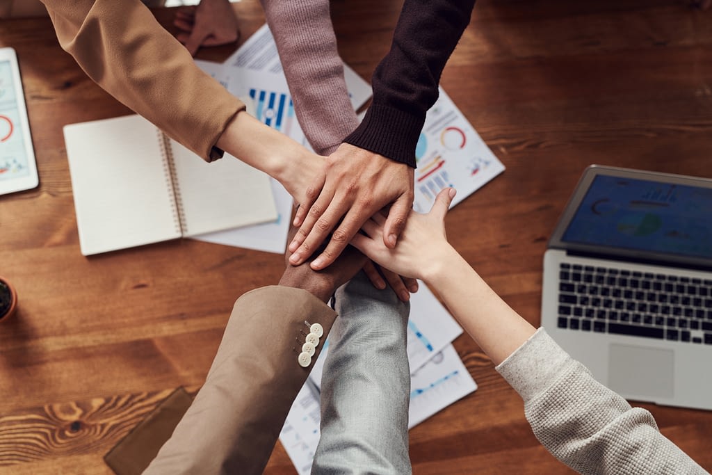 work team hands only huddle